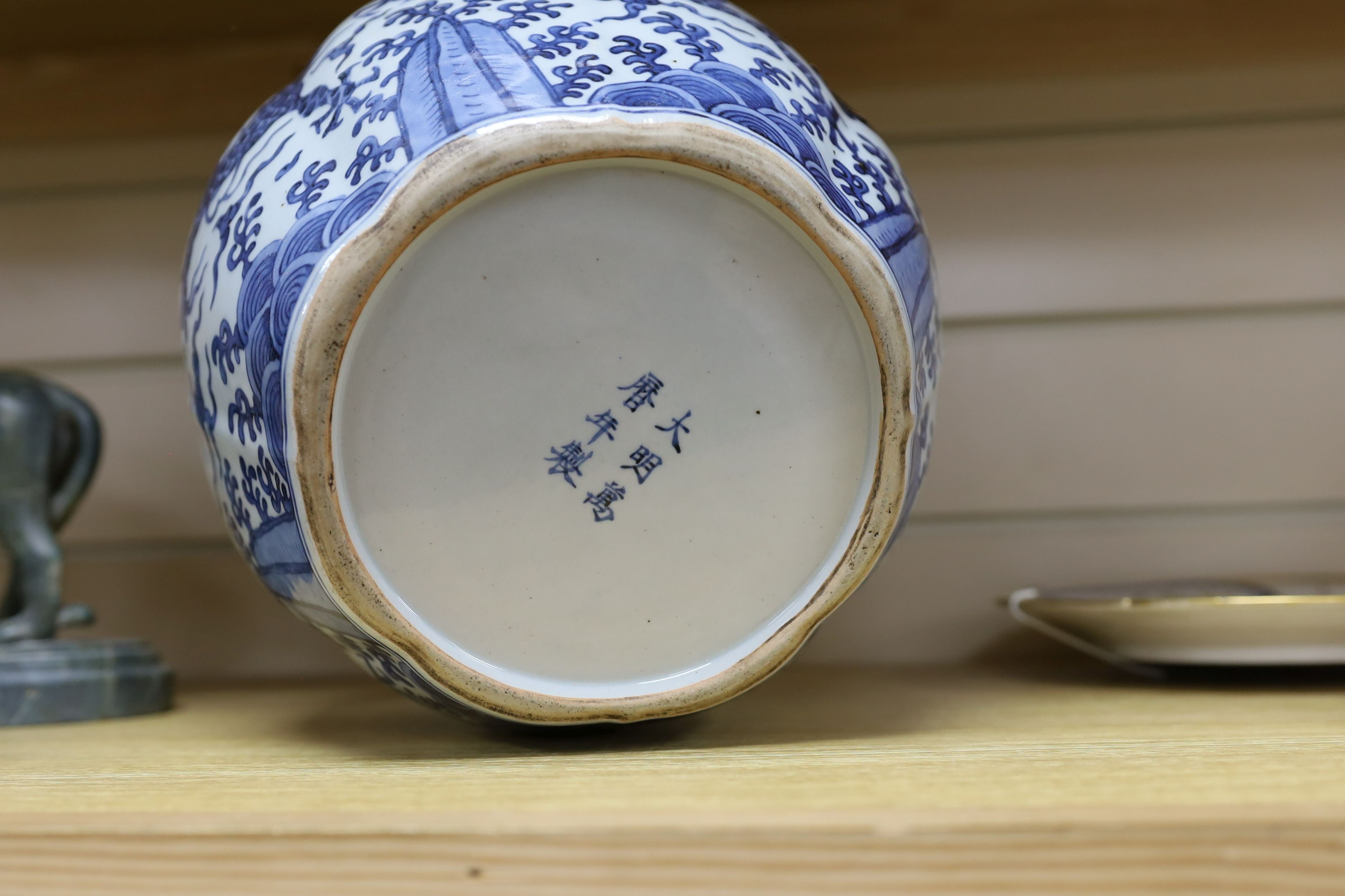 A Chinese blue and white ‘dragon jar, Wanli mark and possibly of the period, 23 cm high